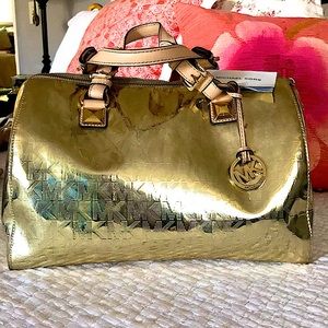 Michael kors gold bag made in Italy.